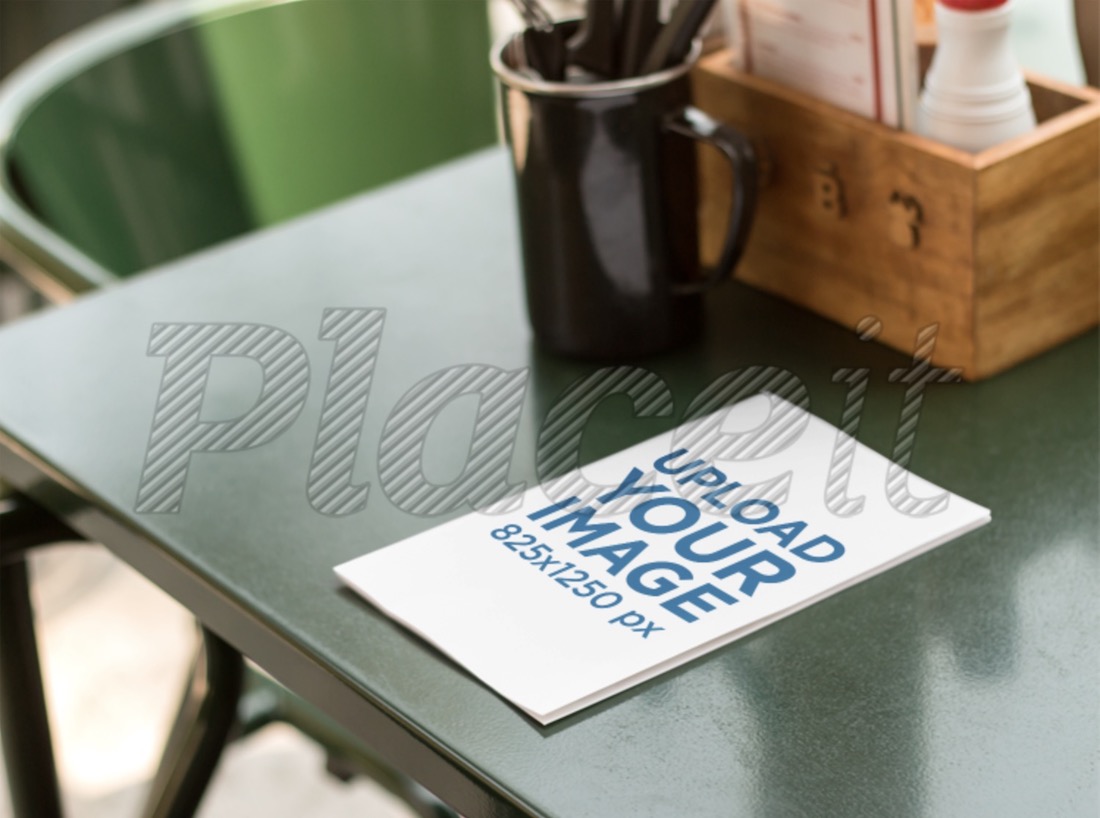bifold brochure mockup of a menu lying on top of table