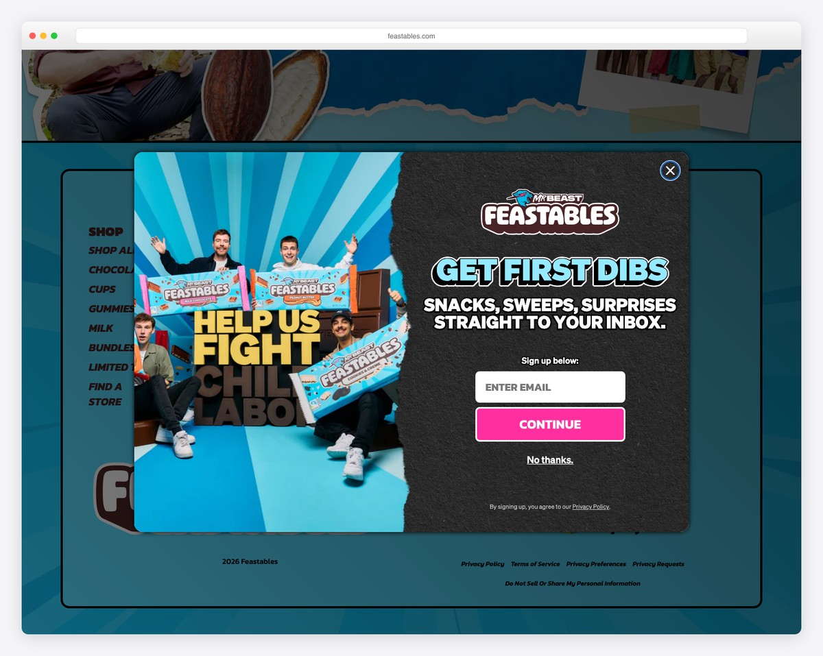 Feastables website footer with bold design and MrBeast branding