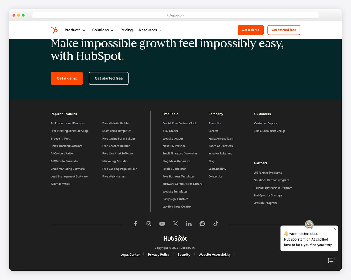 HubSpot footer with organized link columns and social media icons