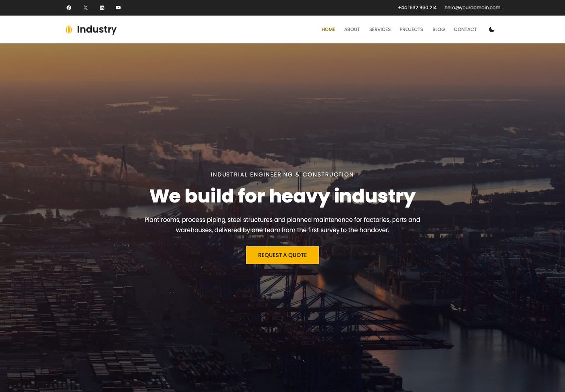 Industry home page: a charcoal top bar and white navigation over a darkened aerial photograph of a port, with the headline We build for heavy industry and a yellow button
