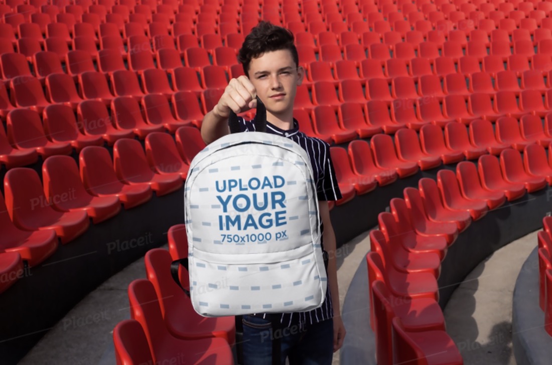 mockup of a young student holding his backpack
