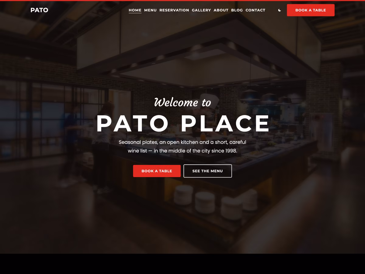 Pato free restaurant WordPress theme home page with its full-screen photograph and booking button