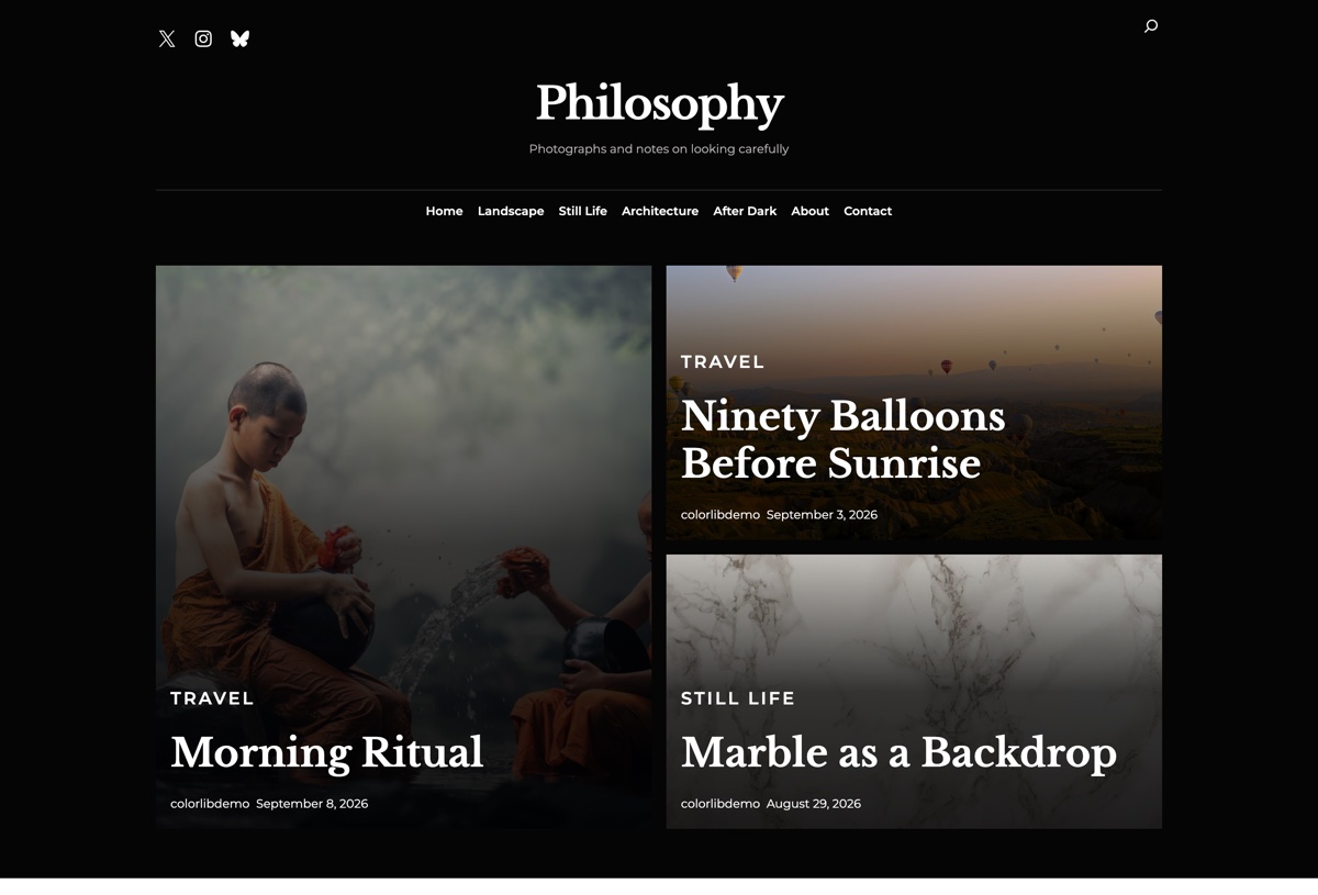 Philosophy free WordPress blog theme homepage with its featured panels and masonry grid