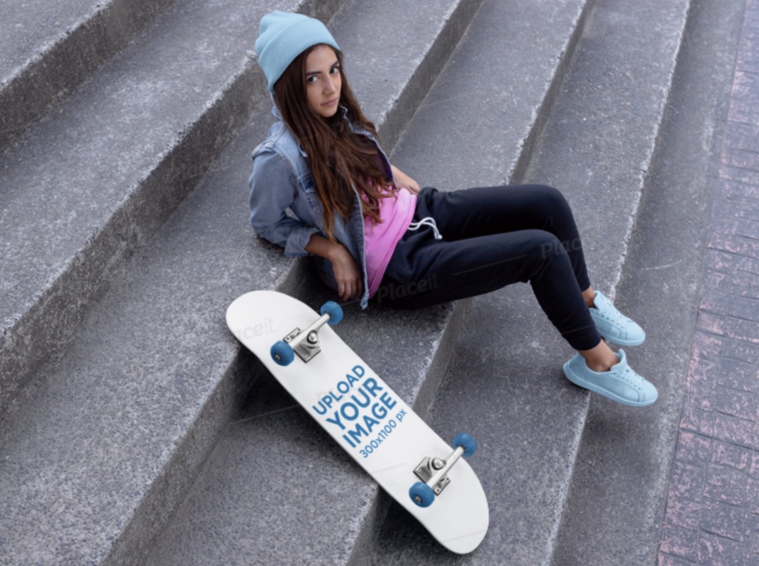 skateboard mockup of a woman with a beanie sitting on a concrete stairway
