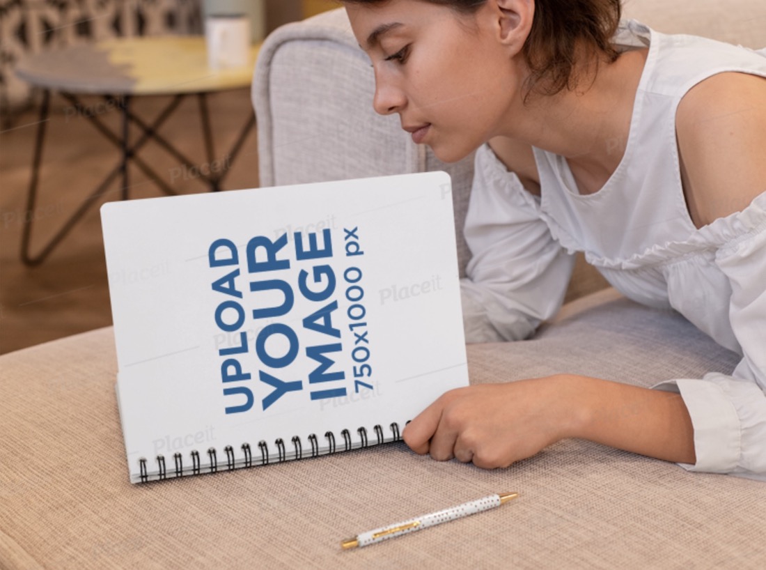 spiral notebook mockup featuring a woman reading
