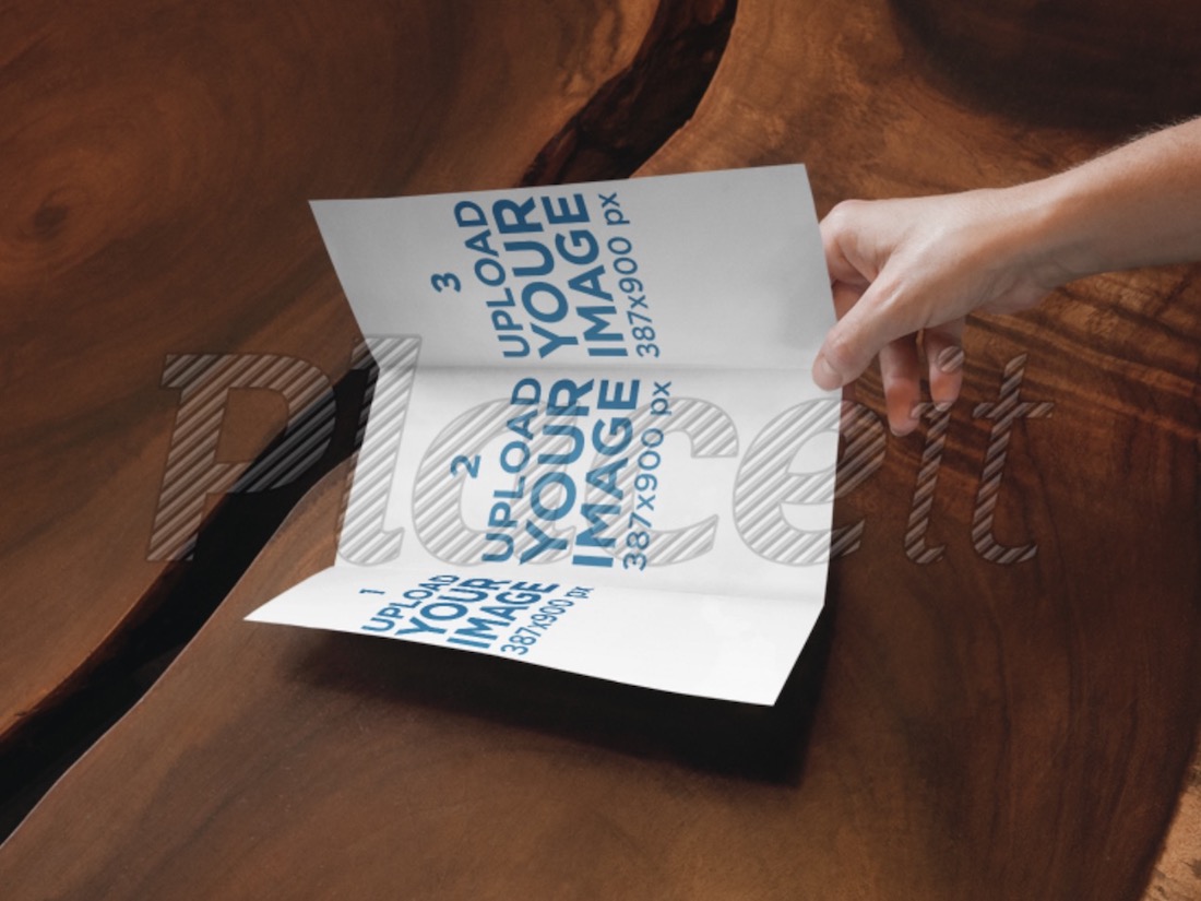trifold brochure mockup in a person hand