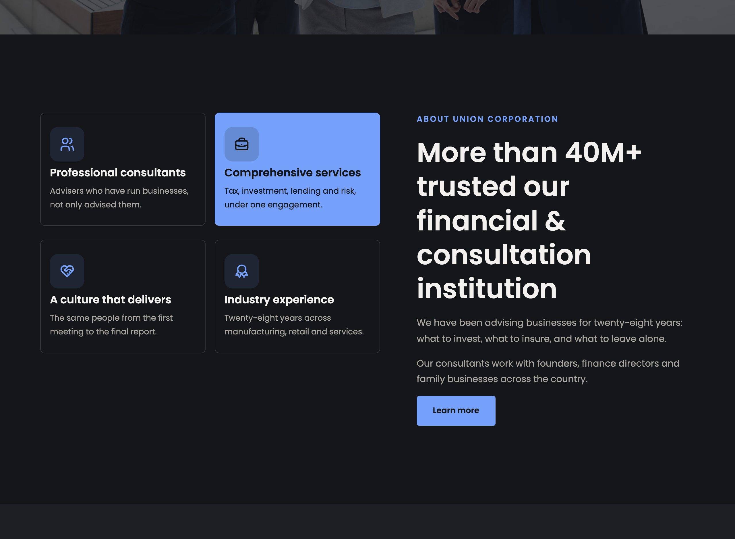 Unioncorp in dark mode: four feature cards with icons, one highlighted in blue, beside the About section headline, two paragraphs and a Learn more button